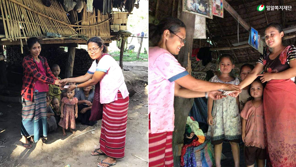 생계지원금을 전달하는 모습.jpg